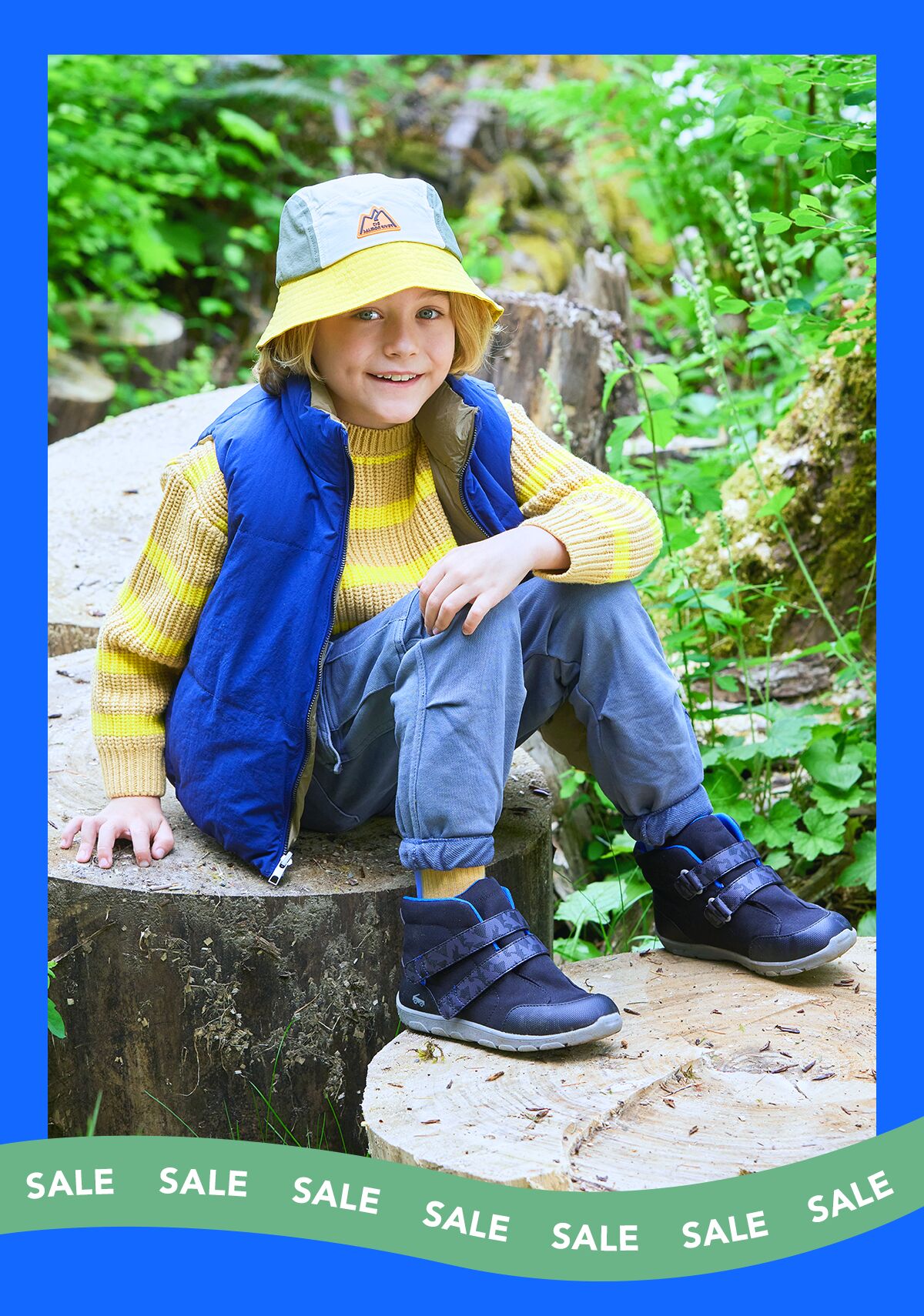Child wearing waterproof adaptive boots