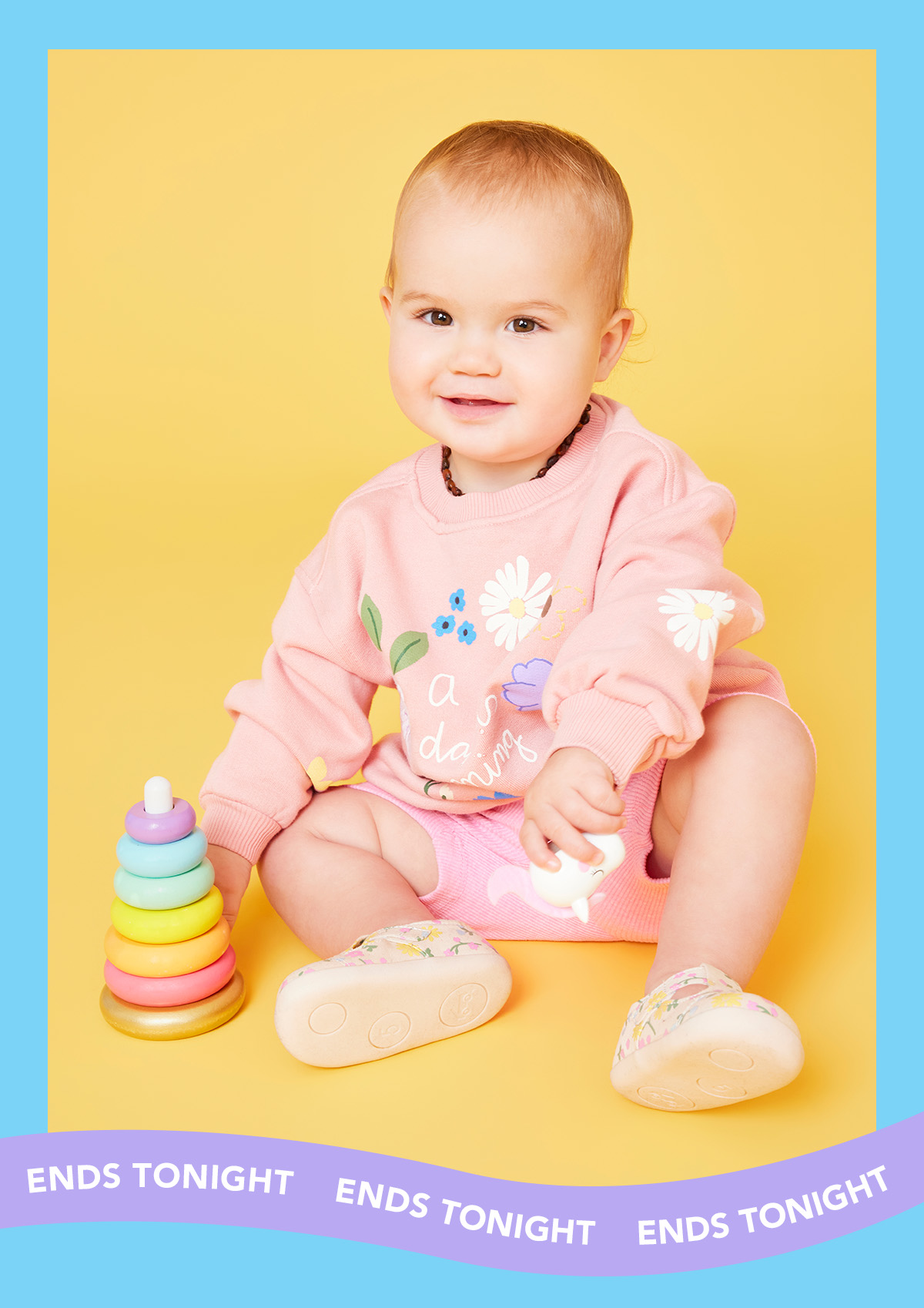 Baby girl wearing the Bianca Mini Oatmeal/Floral